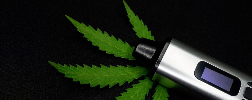 CBD vape with cannabis leaf