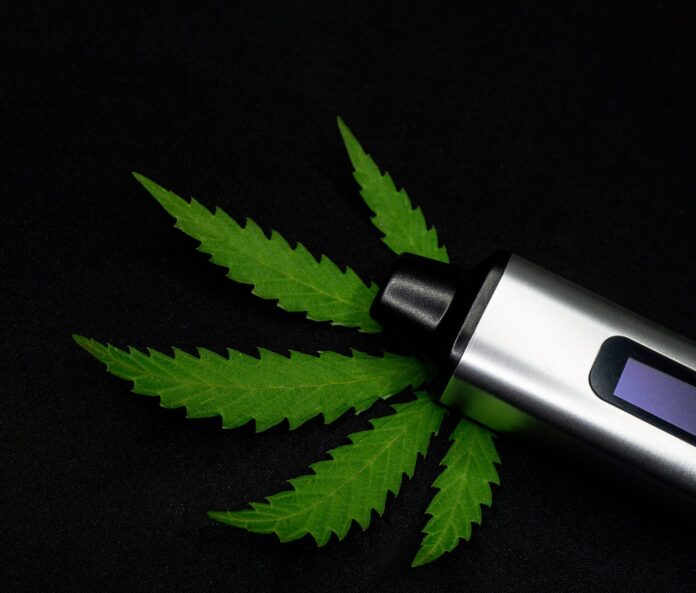 CBD vape with cannabis leaf